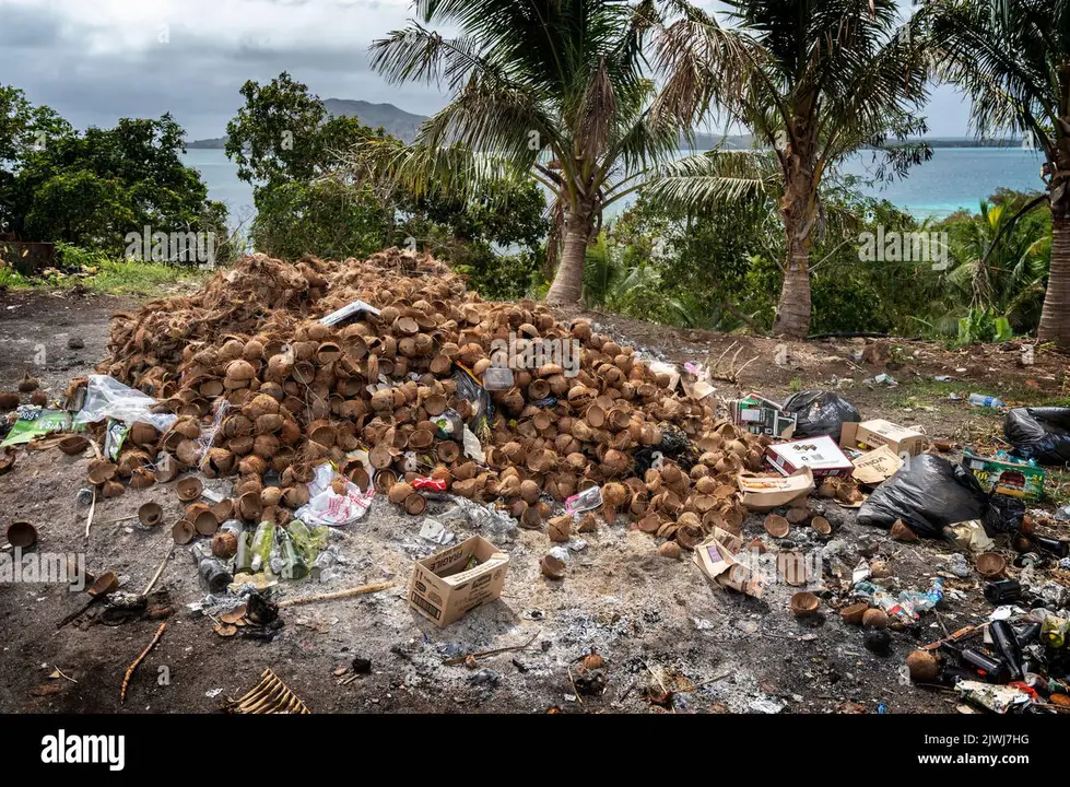 Stop leaving old coconut shells on the highway at Newton roundabout