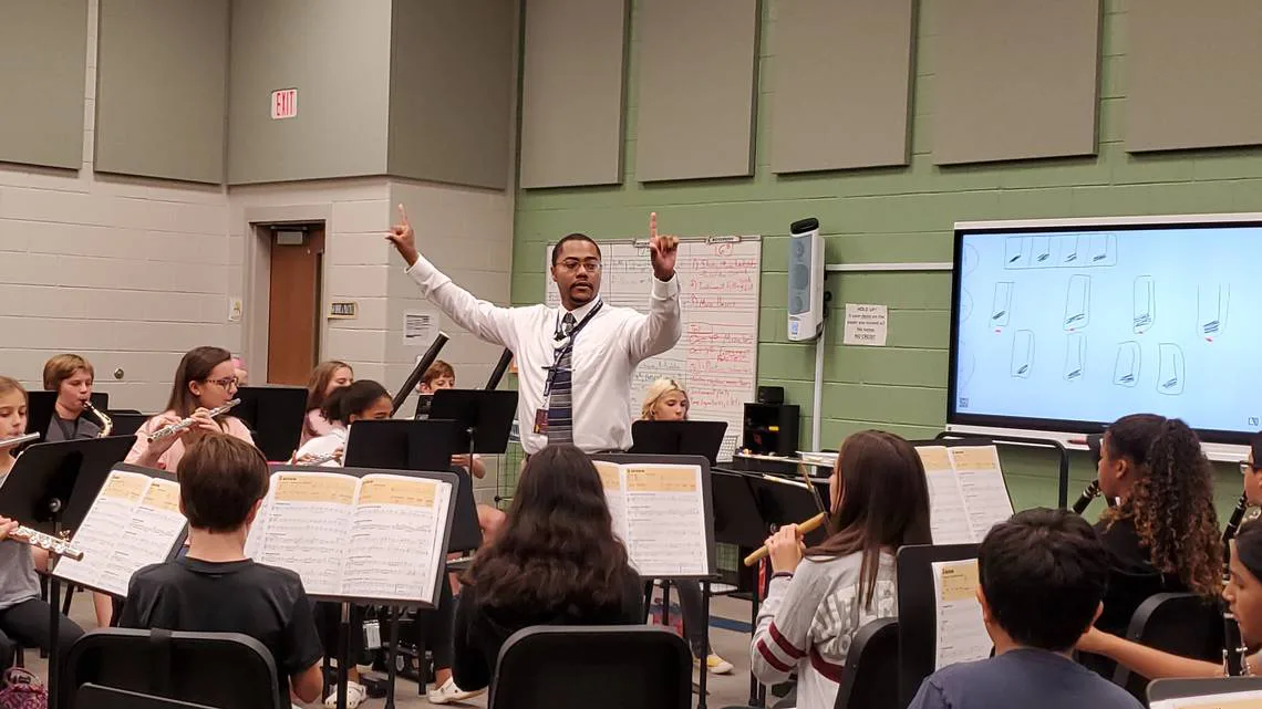 Save Mr. Helm, Sawgrass Springs Middle Band Direct