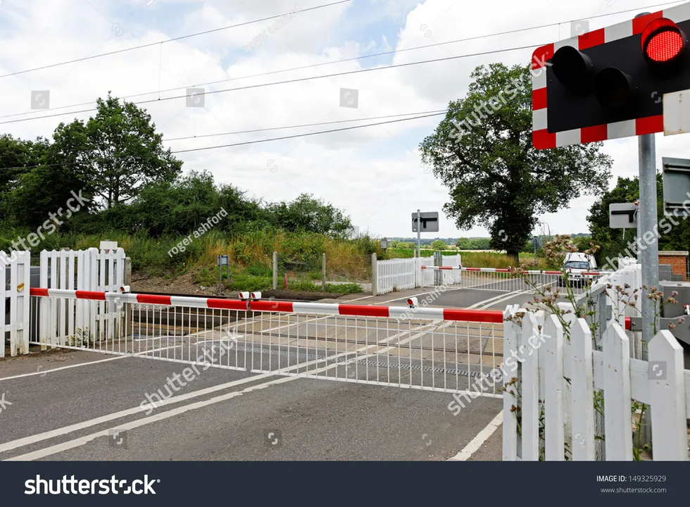 Remove barriers by railway bridge (Kemble)