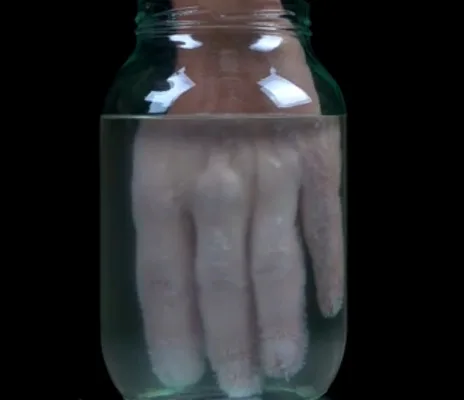 Ian to put his hand in a jar of hot ice.