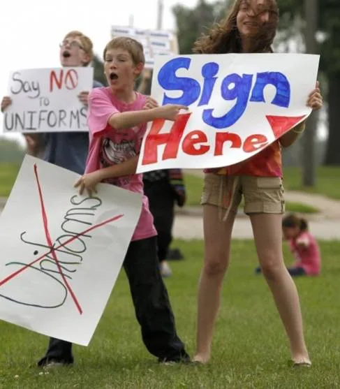 End compulsory uniforms in public schools