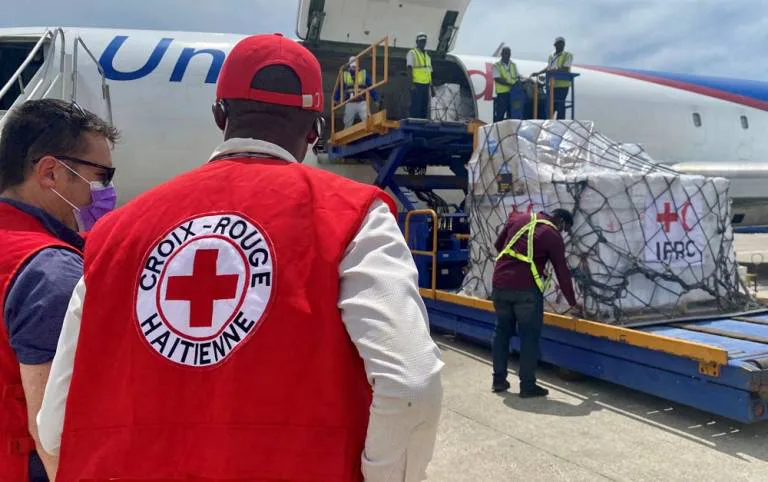 Dear banker, please give 2% of your bonus to Haiti