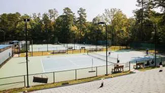 Expand Millbrook Exchange Tennis Parking Lot