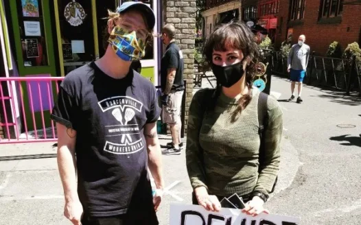Rehire your union workers Voodoo Doughnut
