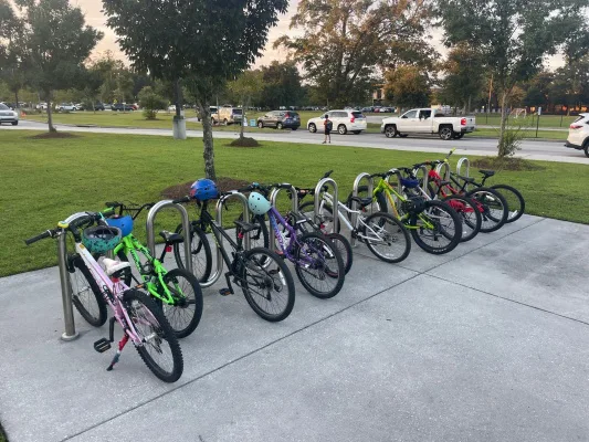 Please install a bicycle rack on the Billy Swails side of Jennie Moore Elementary!!!