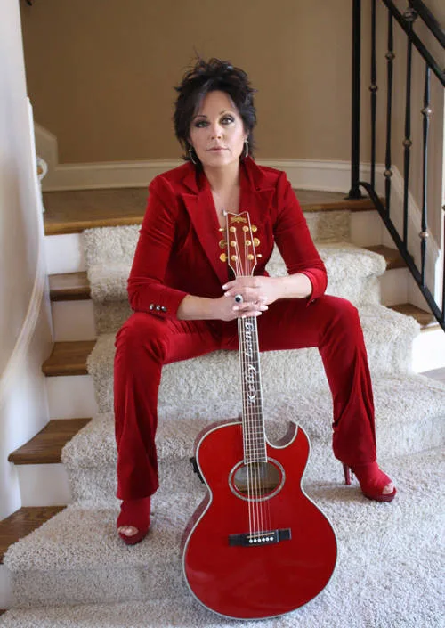 Make "Under A Tennessee Moon" by Kelly Lang a Tennessee State song.