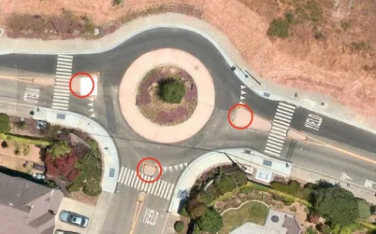Remove Stop Signs at Fairview/Woodstock Roundabout