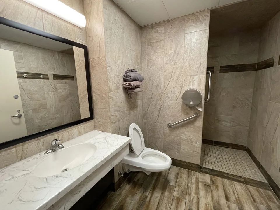 To provide lady's showers at every service station or communal showers and keep them clean for men and women