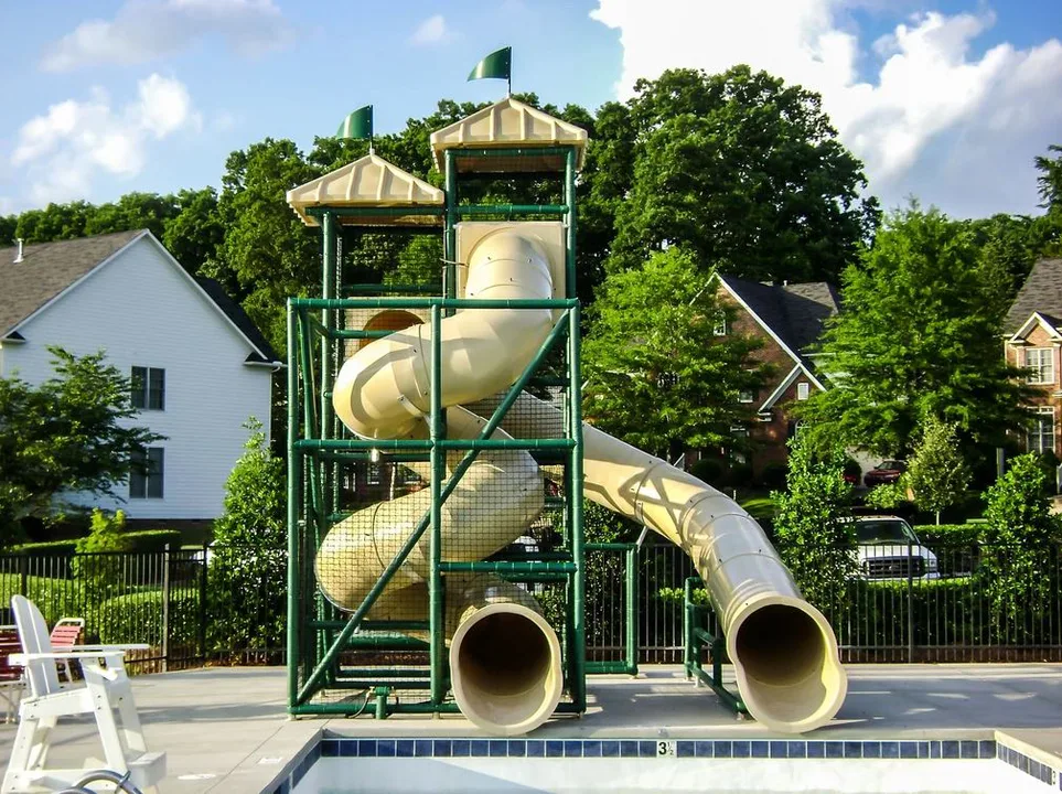 Open Taramore Pool with slide and furniture
