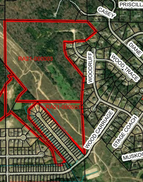 Woodruff Farms against A REQUEST BY ENGINEERING DESIGN GROUP TO REZONE CERTAIN PARCELS FROM R-1,