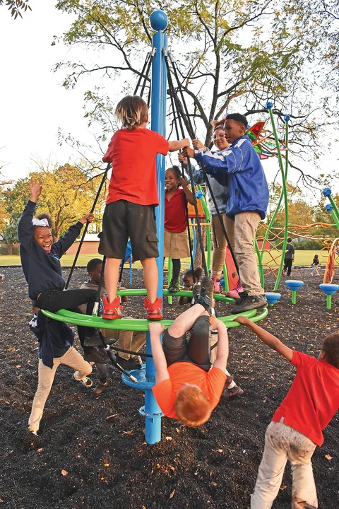 To design and fund from outside funds  a childrens playground in the Hemingway Park Area